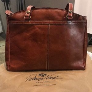 A Patricia Nash shoulder bag lightly used